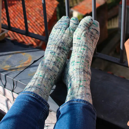Hand-knitted Dimanche socks, worn