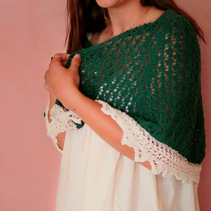 Hand-knitted Gloriette sweater, elegantly worn