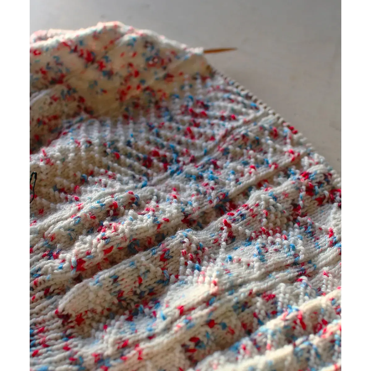Hand-knitted Groomed Snow sweater, front view