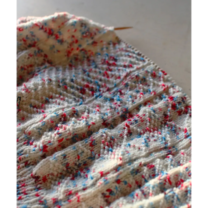 Hand-knitted Groomed Snow sweater, front view