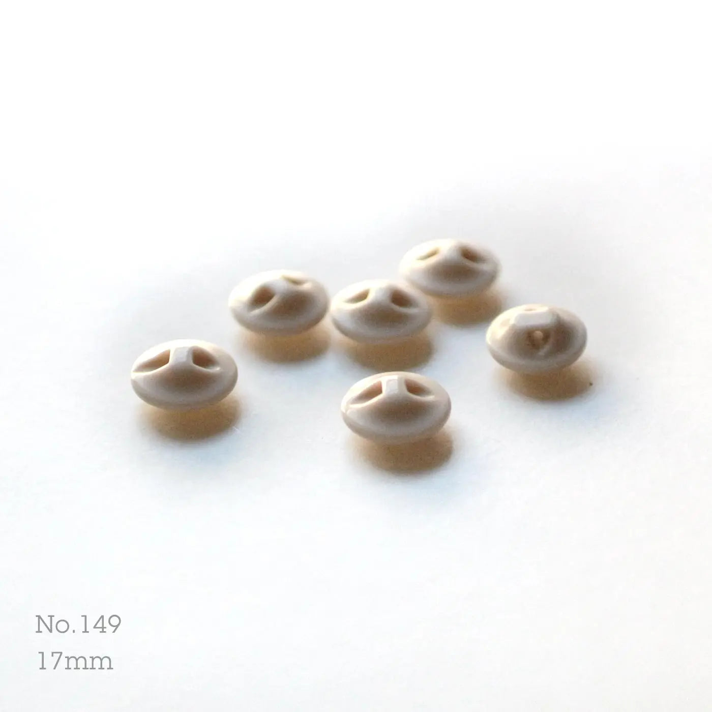Bouton n°149, coloris sombre