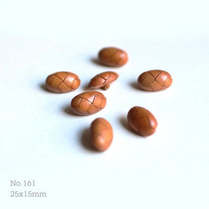 No.161_ 7 boutons vintages en cuir, 25x15 mm