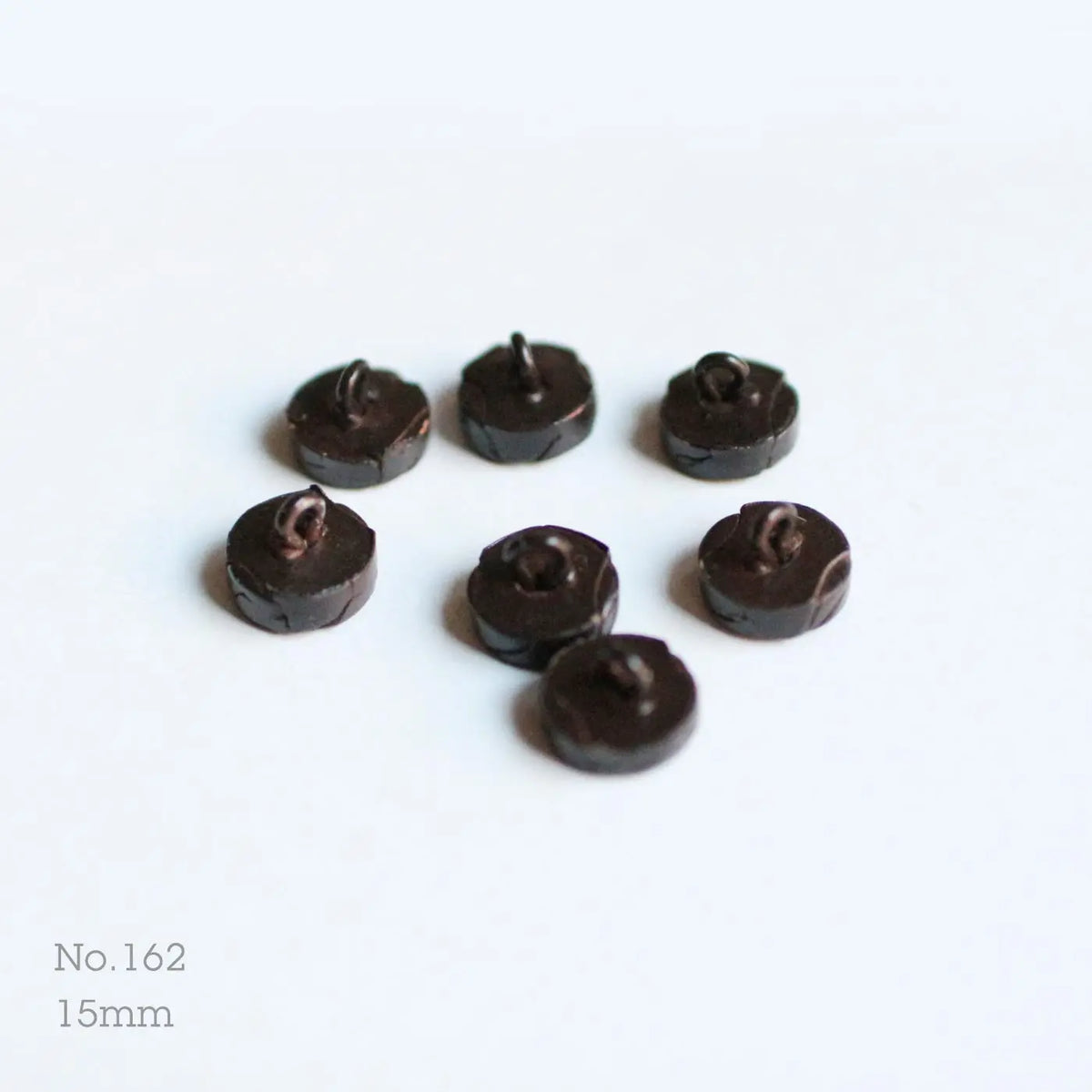 Button No.162, side view