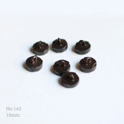 Button No.162, side view